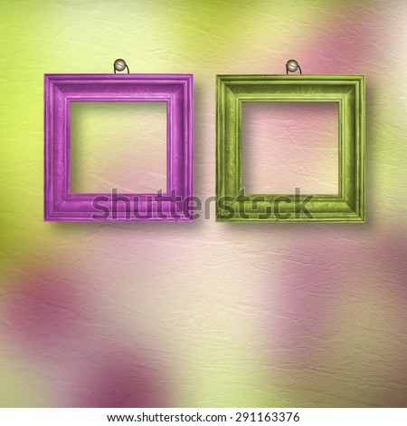Multicolored bright frames hanging on the abstract pastel background