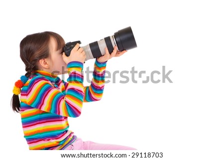 Young girl taking photos