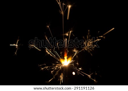 Christmas sparkler on black background