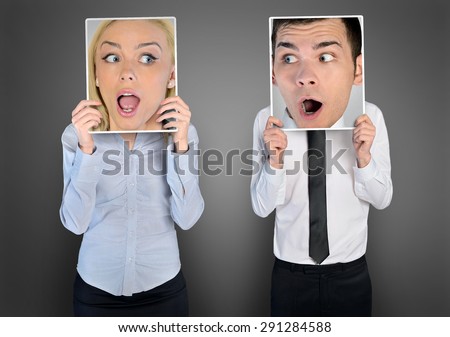 Surprised face of business woman and man