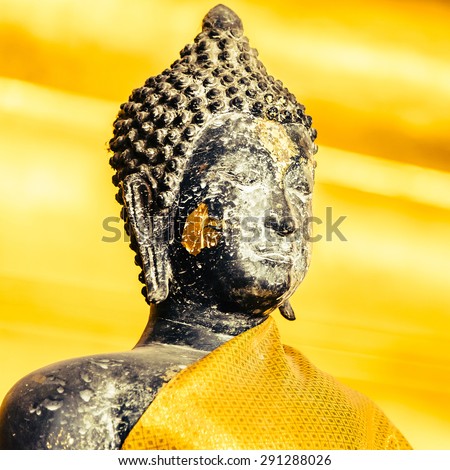 Selective focus point on Buddha statue in wat arun from thailand bangkok - vintage effect style pictures