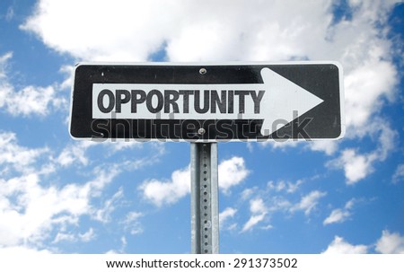 Opportunity direction sign with sky background