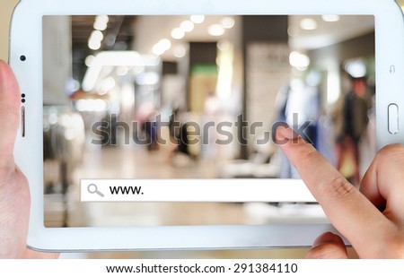 On line shopping on tablet screen, business, E-commerce, technology and digital marketing background
