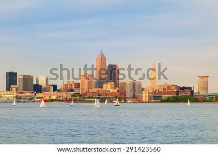 Cleveland, Ohio, near sunset, viewed from out on Lake Erie Royalty-Free Stock Photo #291423560