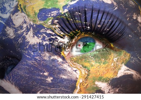 womans face with planet Earth texture and djibouti flag inside the eye. Elements of this image furnished by NASA.