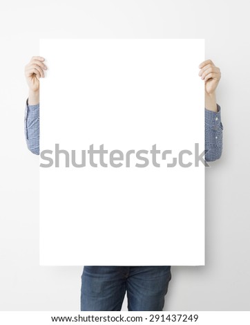 man holding blank poster on white background