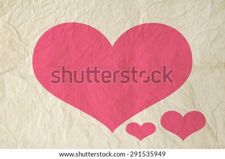 Pink Heart shape on old vintage paper background