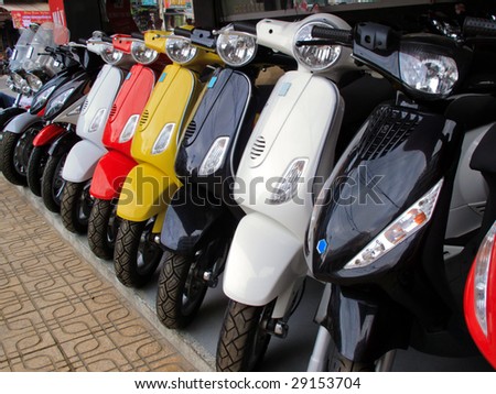 Close up of a row of motor bikes Royalty-Free Stock Photo #29153704