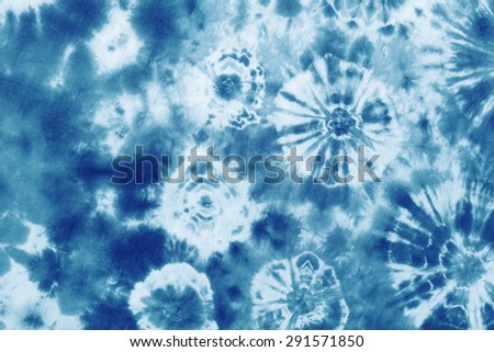 tie dyed pattern on cotton fabric abstract background.

