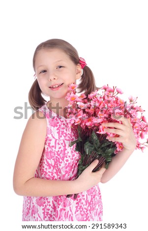 pretty little girl with the bunch of the summer flowers