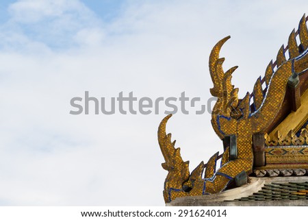 roof detail of Thai buddhism temple architecture with blue sky