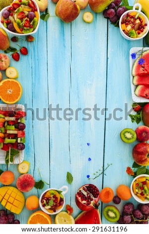Fruits, Fruit salad - diet, healthy breakfast, frame with space for text Royalty-Free Stock Photo #291631196