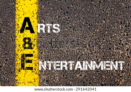 Concept image of Business Acronym AE as Arts And Entertainment written over road marking yellow paint line.
