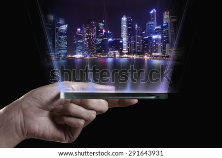 Hand holding transparent 3D smartphone. A 3D phone is a mobile phone that conveys depth perception to the viewer by employing stereoscopy or any other form of 3D depth techniques.  Royalty-Free Stock Photo #291643931