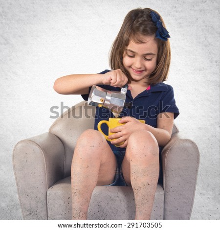 Girl holding a cup of coffee 