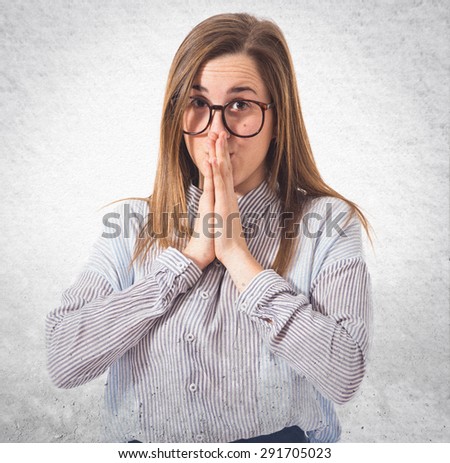 Girl pleading over textured background