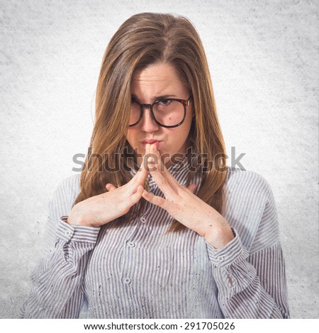 Girl thinking over textured background