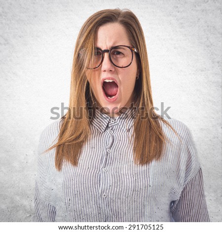Girl shouting over textured background
