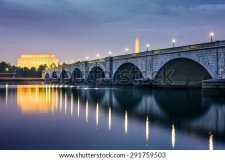 Washington DC, USA skyline on the Potomac River with Lincoln Memorial, Washington Monument, and Arlington Memorial Bridge.
