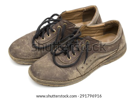 dirty shoes on the white background