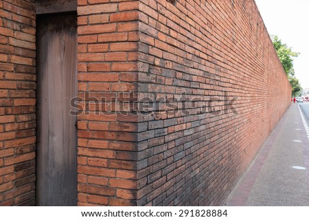 View around antique brick wall - Tha Phae Gate Royalty-Free Stock Photo #291828884