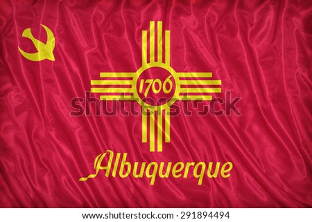 Albuquerque ,New Mexico flag pattern on the fabric texture ,vintage style
