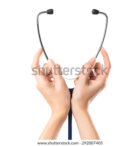 Closeup shot of a woman hand holding a medical stethoscope isolated on white background. Close up of stethoscope holding with two female hands. 