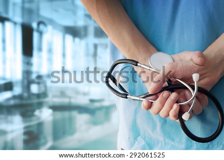 Doctor with stethoscope in a hospital Royalty-Free Stock Photo #292061525