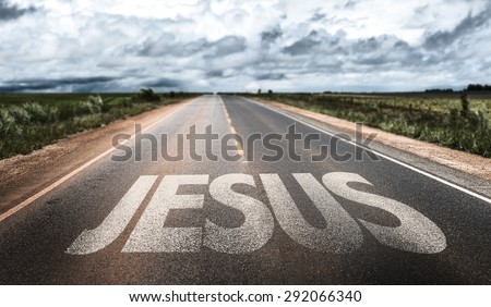Jesus written on rural road Royalty-Free Stock Photo #292066340