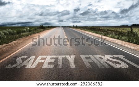 Safety First written on rural road Royalty-Free Stock Photo #292066382