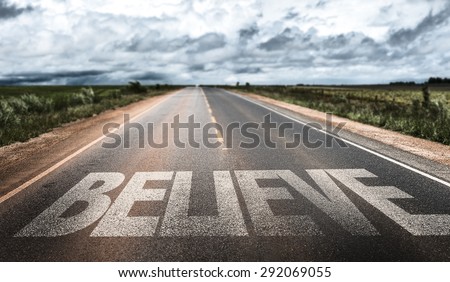 Believe written on rural road Royalty-Free Stock Photo #292069055
