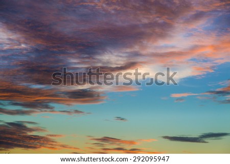 Bright orange and yellow colors sunset sky / Yellow blue sunrise sky with sunlight background