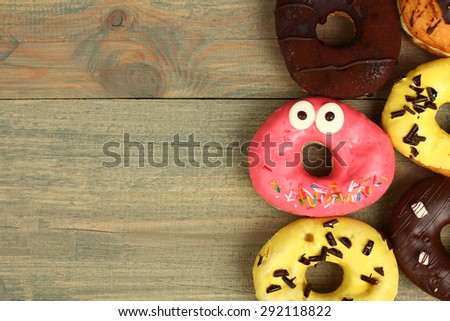 Donuts on wooden background
