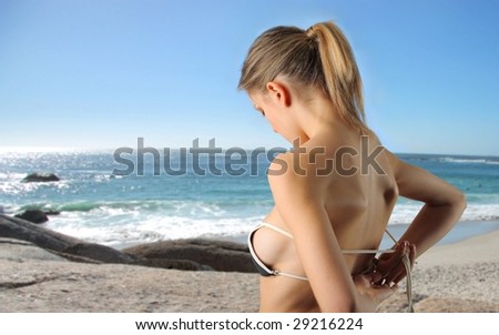 blond girl wearing swimsuit