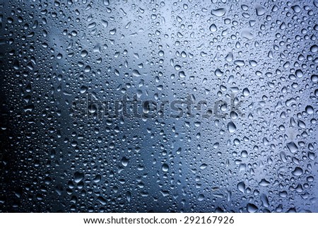 water drops on glass - abstract background