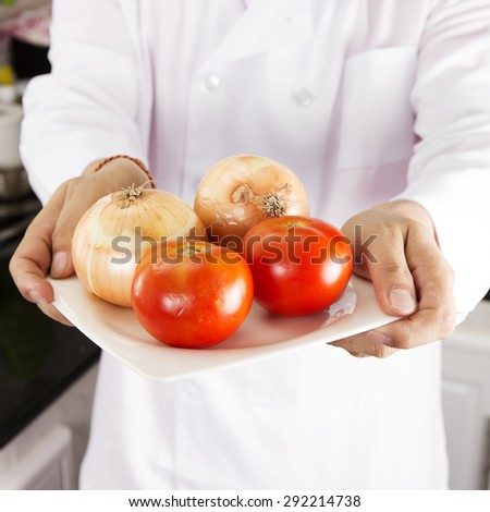 Chef presented Onion and Tomato / Cooking Hamburger concept