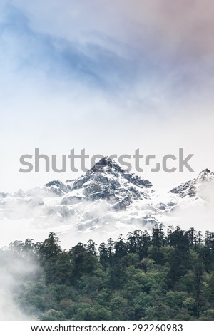 Snow mountain with fog , Lachen North Sikkim India Royalty-Free Stock Photo #292260983