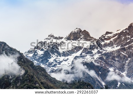 Snow mountain with fog , Lachen North Sikkim India Royalty-Free Stock Photo #292261037