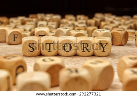 STORY word written on wood block