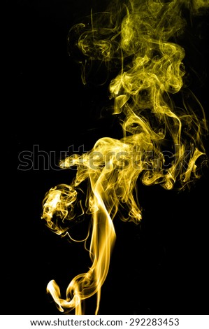 Abstract gold smoke on black background, gold background,gold ink background