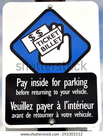Pay parking sign