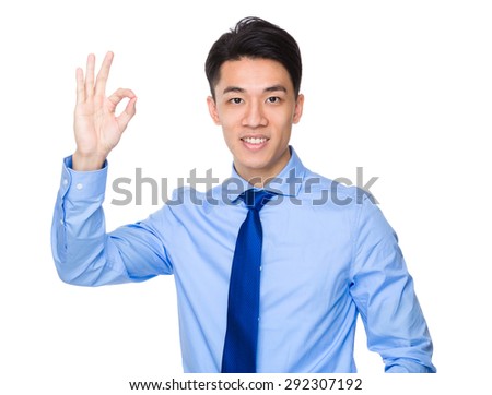 Businessman with ok sign gesture