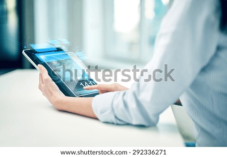 business, technology, communication and people concept - close up of woman with tablet pc computer networking at office or home