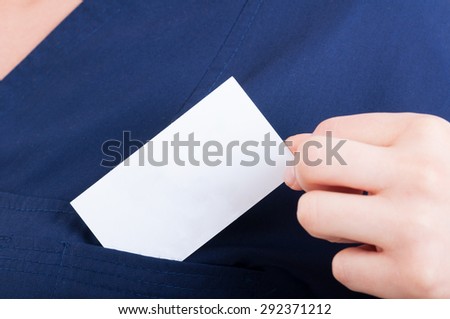 White or blank card with copy or text space in doctor pocket. Empty business card concept