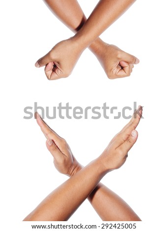 Man making an X sign by crossing his hands isolated on white background.