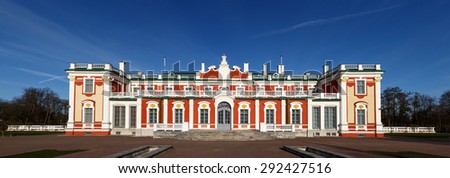 Front view of Kadriorg Palace in Tallinn Estonia, built by Tsar Peter the Great in 1725, on navy blue sky background.