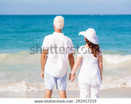 Happy couple together on the beach