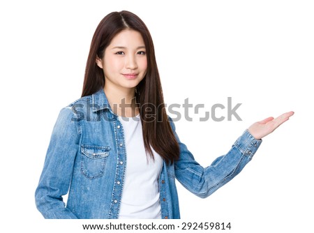 asian young woman with hand present some information