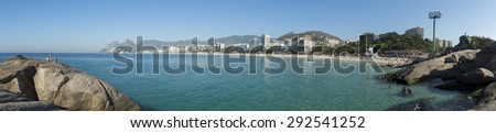 Scenic panoramic view of Ipanema Beach from the rocks at Arpoador with the city skyline in Rio de Janeiro Brazil