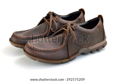Brown casual leather man shoes isolated on white background, selective focus. 